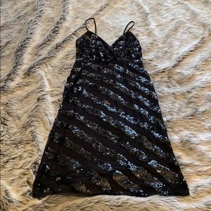 Black knee length dress with sequins